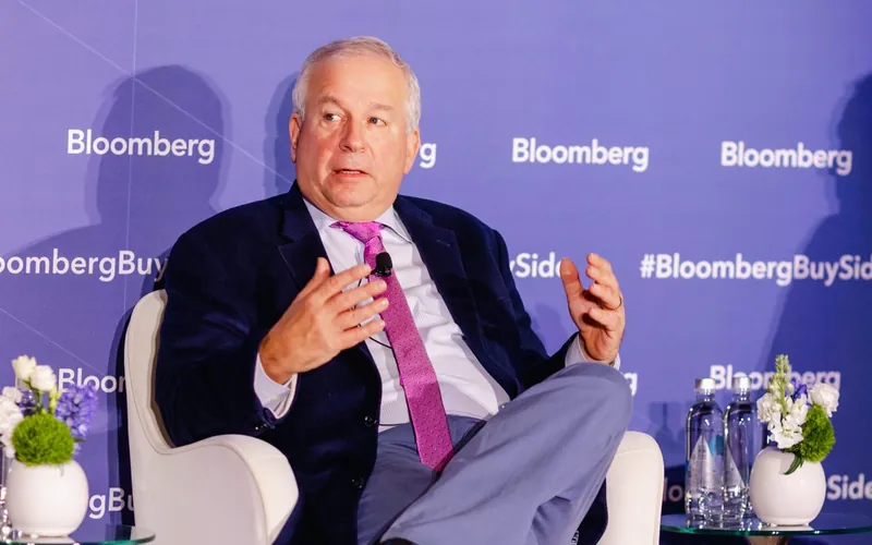 David Rosenberg speaking on stage at a Bloomberg event